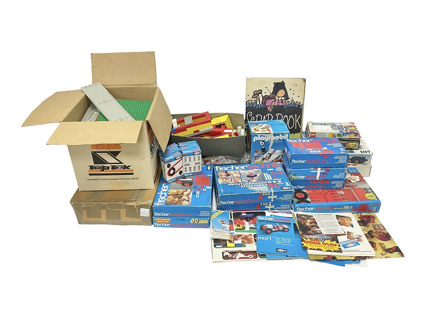 Fischer Technik/Lego/Playmobil - thirteen model building sets comprising eight Fischer Technik sets 50, 50/1, 50v, 50/2, 50+mot1 and two 50S, 50/1 add-on pack, with spare parts packs 01, 03, 05, two 22 and 30; two Lego sets comprising C107 and Lego Systems 103, part-set 870 and 970; Playmobil no.3520 set; four boxes of loose lego, various instruction manuals and a scrapbook 