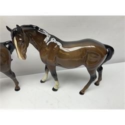 Four Beswick horses, including Exmoor no 1645, Black Beauty foal and two others 