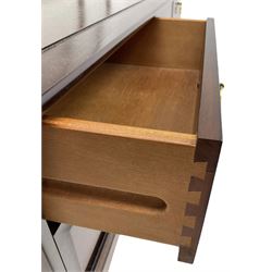 Stag Minstrel - triple mirror back dressing table, fitted with six drawers