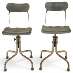 Pair of mid 20th century 'Tan-Sad' industrial chairs, black moulded fibre seats, raised on...