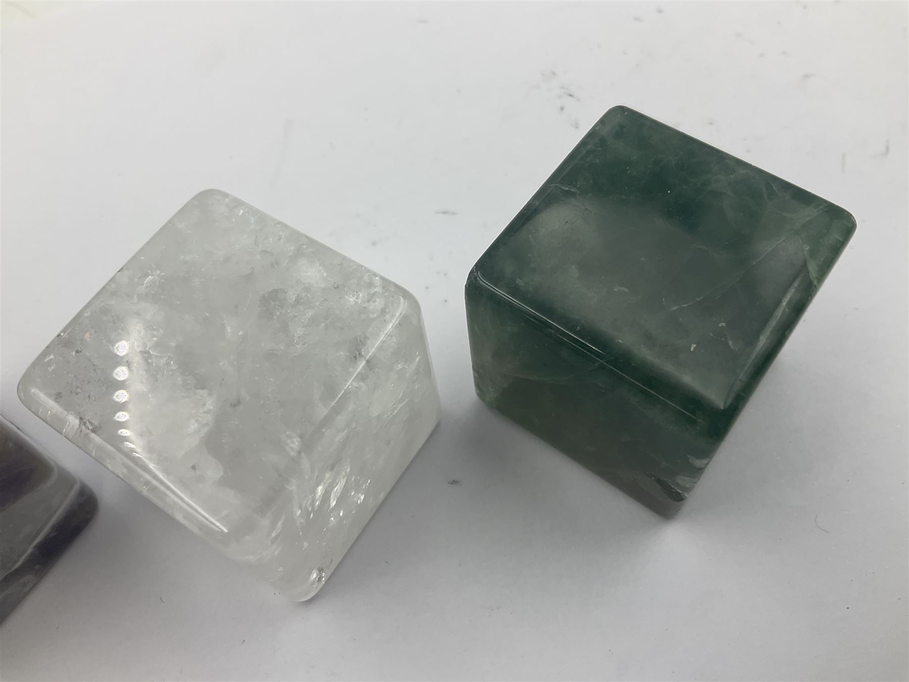 Ten cube mineral specimens, each cut and polished to highlight natural formations, including tiger eye, green aventurine, rose quartz, opalite, amethyst etc, H3cm 