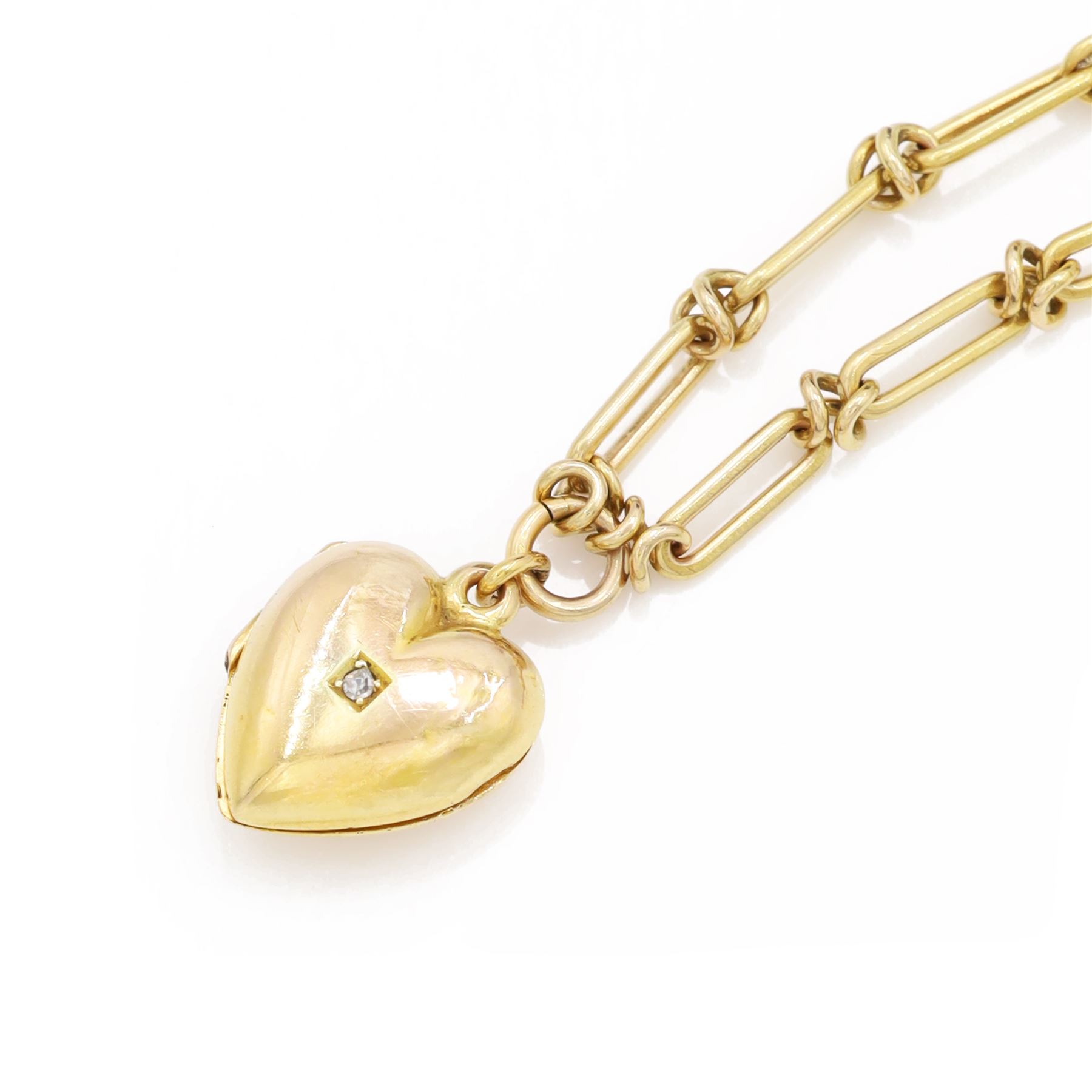 Victorian 18ct gold trombone link necklace, suspending a 15ct rose gold heart locket, set with a single old cut diamond