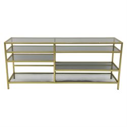 Modern glass and gilt metal media stand, rectangular smoked glass top panel set within a gilt finished metal surround, raised on square section legs, the underside fitted with a full-width glass shelf