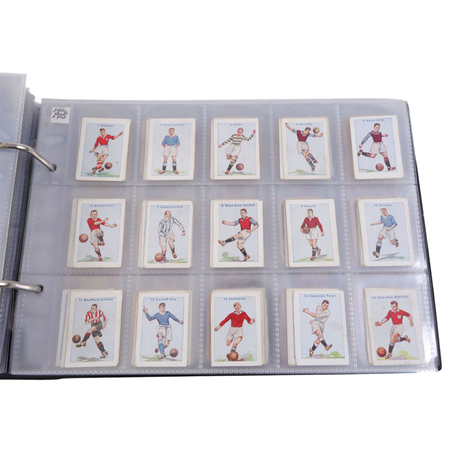 Collection of 1930s and later Football related trading and cigarette cards, including complete set of sixteen 1936 Topical Times Panel Portraits of Star Footballers, collection of further 1930s Footballer Panel Portraits, complete set of twenty-five 1955 The Wizard Famous Footballer cards, complete set of fifty Wills Association Footballers 1935, complete set of fifty Godfrey Phillips International Caps cards, etc, housed in three albums