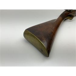 Early 19th century 15-bore flintlock converted to percussion cap fowling piece, the lock stamped T. Richards, walnut half stock with brass fittings including trigger guard with pineapple finial and 91cm barrel with ramrod under L129cm overall