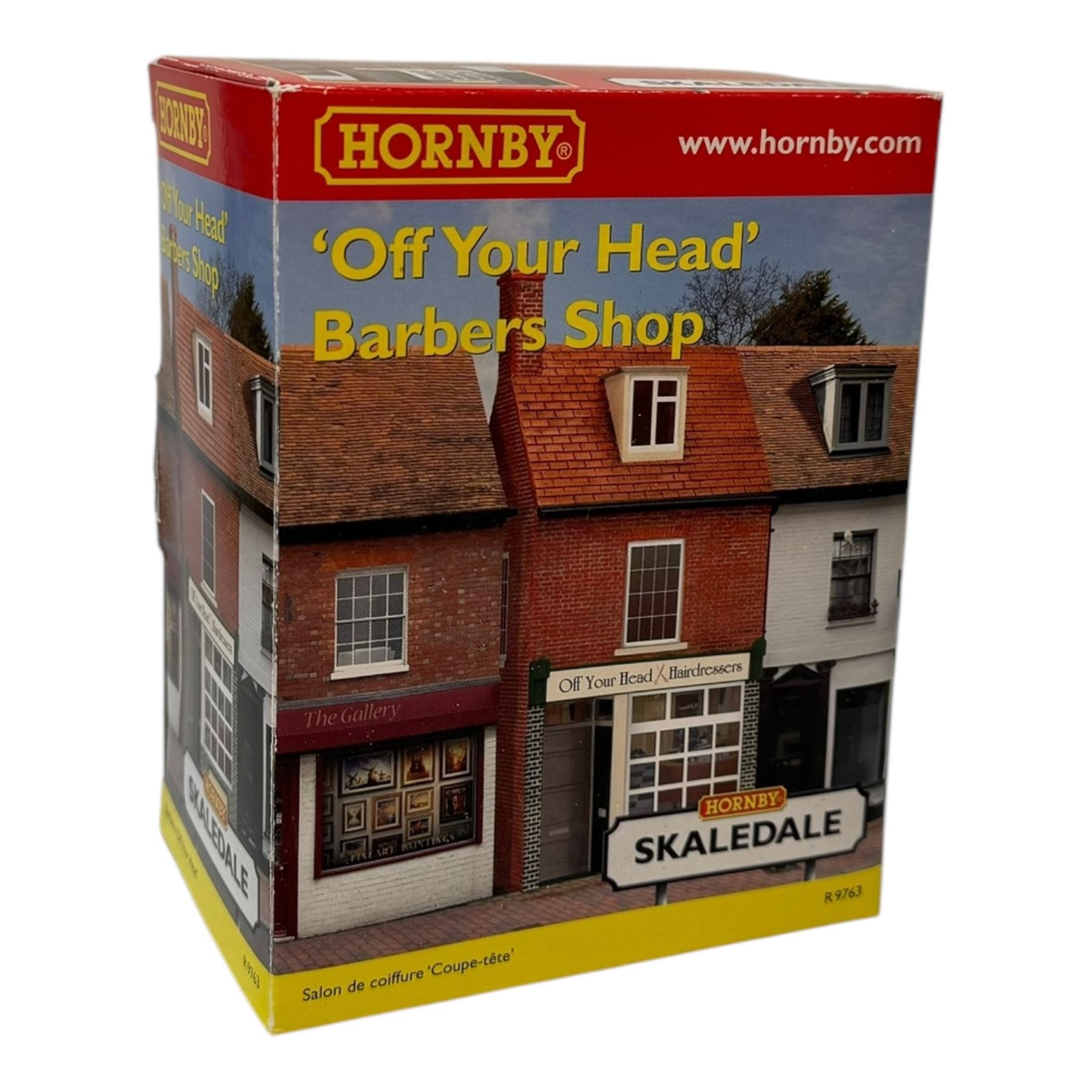 Ten Hornby '00' gauge Skaledale buildings, comprising two R8744 Straight Walls, R8564 Model Shop, R9768 The Pharmacy, R8501 Raven Cottage, R8515 Clovelly Cottage, R8626 Country Fire Station, R8588 Weighbridge & Scales, R8638 Platform & Shelter and R9763 Off Your Head Barbers Shop, all boxed