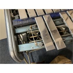 Trixon three-octave vibraphone c1965; with tubular frame, blue panelled ends, four wheels and detachable vibration motor with rubber belts; 1960s Trixon logo to front; serial no.5807; L130cm; together with a selection of various beaters in canvas carrying bag