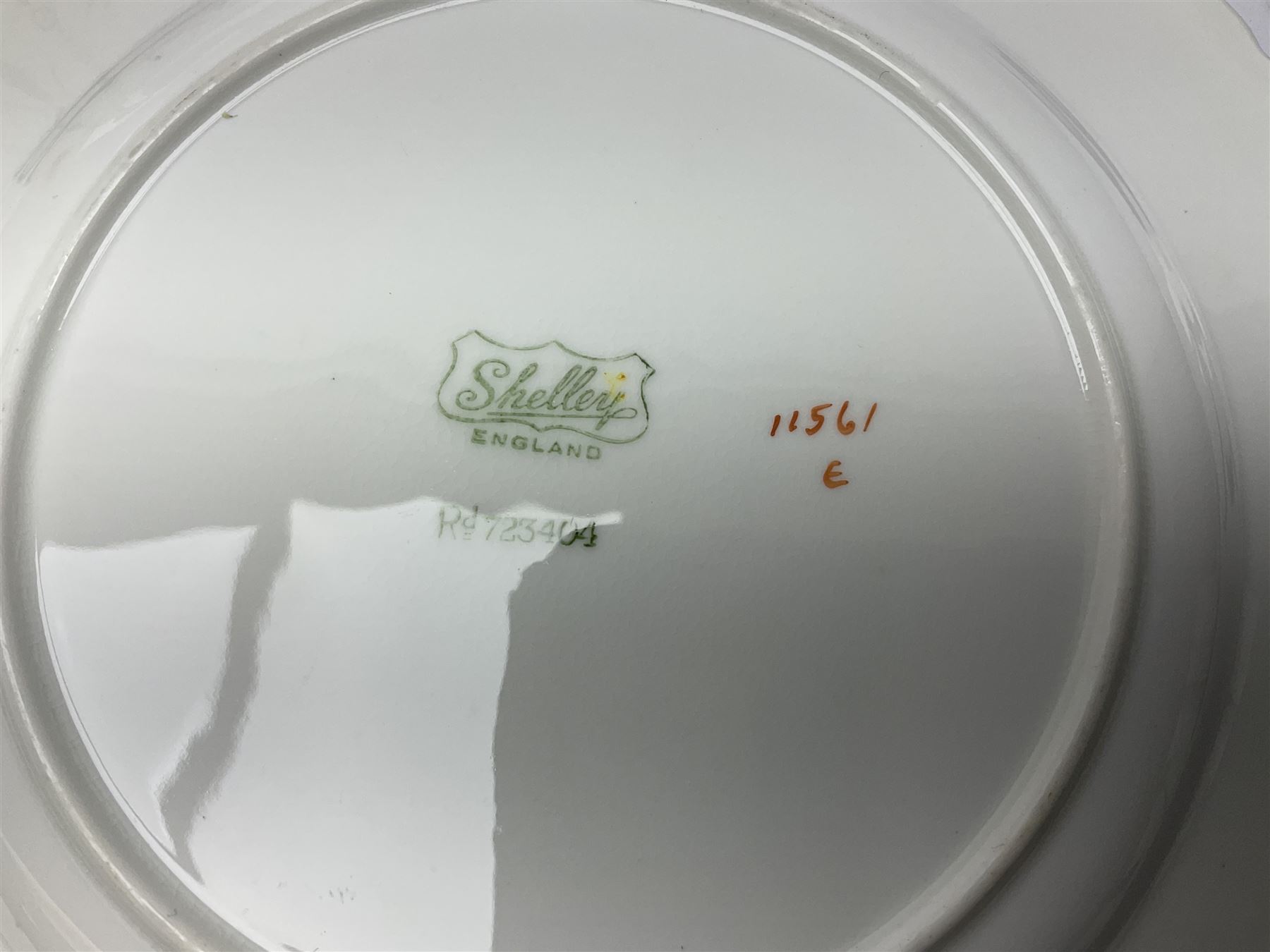 1920s Shelley Queen Anne shaped trio, decorated in the Blue Iris pattern no. 11561, ith printed mark beneath 