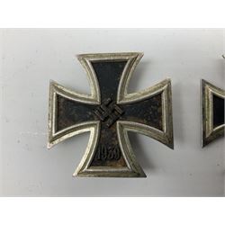 WW2 German Iron Cross 1st Class, back of pin indistinctly stamped ?20; and WW2 German Iron Cross 2nd Class, ring indistinctly stamped ?100 for Rudolf Wachtler und Lange (2)