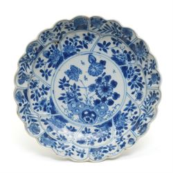 18th century Chinese Kangxi period blue and white lobed dish, decorated with flowers and b...