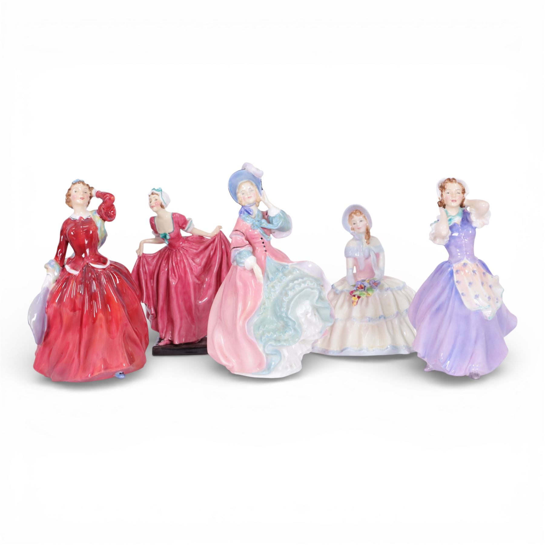 Five Royal Doulton figures, comprising Spring Morning HN1922, Betsy HN2111, Blithe Morning HN2065, Delight HN1772 and Daydreams HN1713