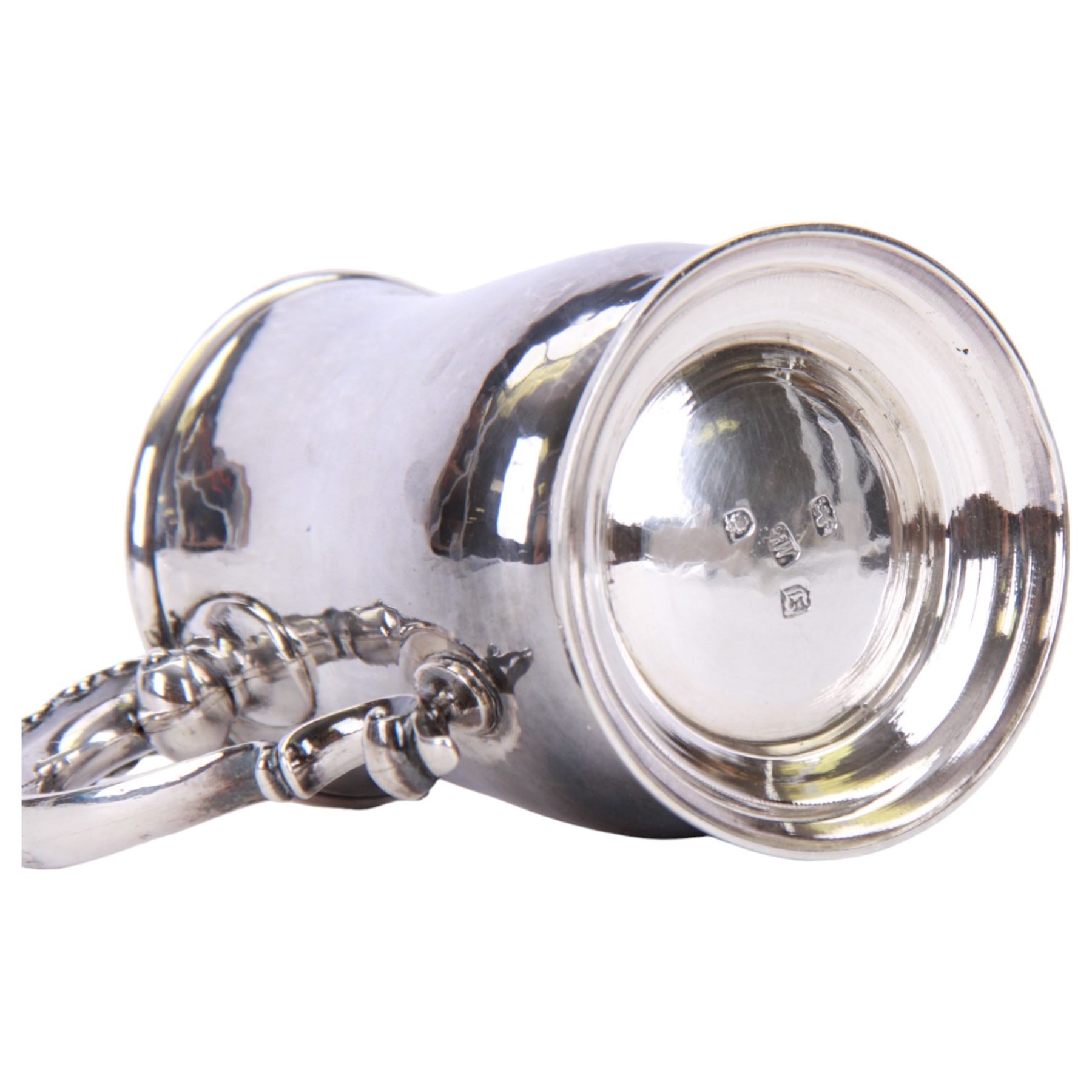 George III silver mug, of bellied form with acanthus capped scroll handle, upon a circular stepped foot, hallmarked Fuller White, London 1764, H12cm