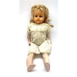Early 20th century Cuno and Otto Dressel wax shoulder head doll with applied hair and fixed glass eyes, soft body with jointed composition lower limbs, maker's stamp to right thigh, clothing and box H38cm in original box
