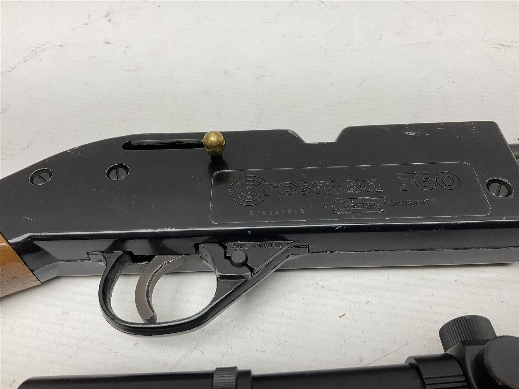 Crosman 760 .177 cal. Junior air rifle with under lever faux pump action and simulated wooden fittings; serial no.278047476, L90cm overall; and SMK B1 Synthetic .22 cal. Youth's air rifle with break-barrel action and 4 x 20 scope; serial no.1721229956084915F, L98.5cm overall (2)  NB: AGE RESTRICTIONS APPLY TO THE PURCHASE OF AIR WEAPONS.