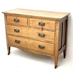 Edwardian oak chest, two short and two long drawers, square tapering supports 