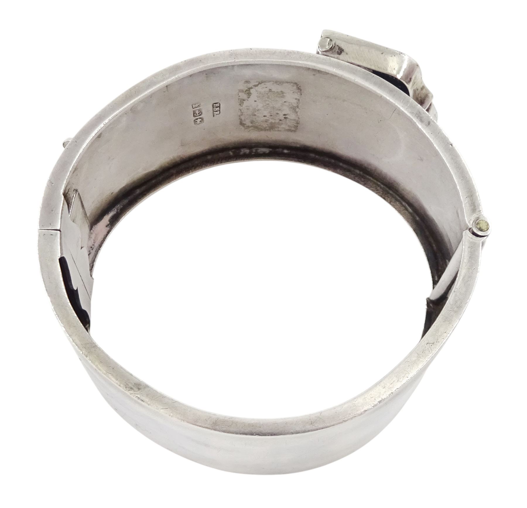 Victorian silver hinged buckle bangle with ivy leaf bright cut decoration by H Bros, Birmingham, 1884