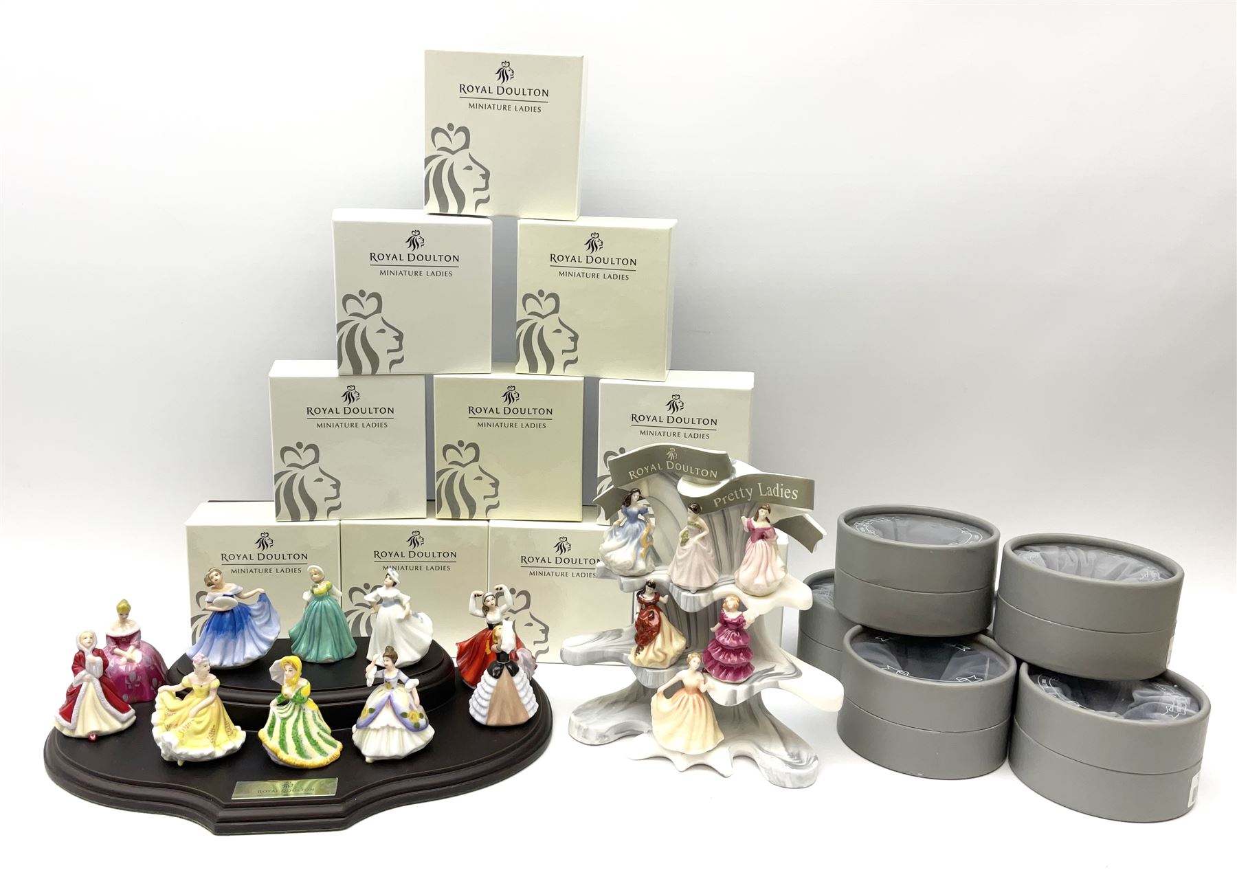 Six Royal Doulton Pretty Ladies figures, comprising Rebecca, Belle, Deborah, Jennifer, Jessica, and Lauren, with display stand, together with ten Royal Daulton Miniature Ladies figures, Ninette, Christine, Rachel, Elizabeth, Margret, Karen, Elaine, Victoria, Jane, and Susan, with display stand, all with boxes. 