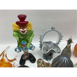 Robert Held iridescent art glass sea urchin paperweight, signed to underside, together with Murano glass clown and a collection of other glass paperweights and animals, etc 