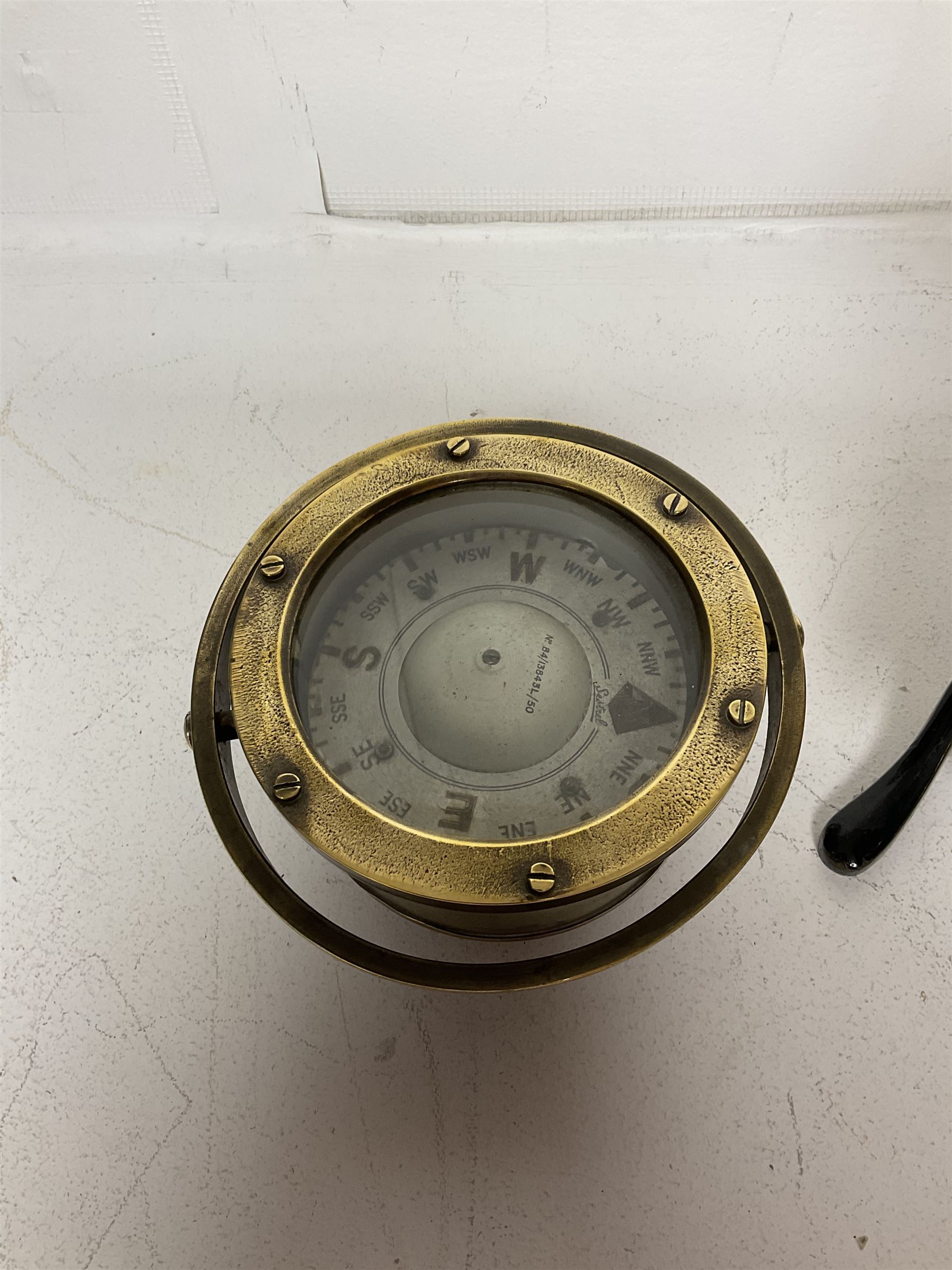 Early 20th century lacquered brass microscope stamped 'VOIGTLAENDER BRAUNSCHWEIG no 798' and Sestrel brass cased compass