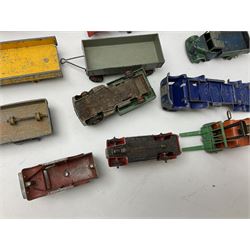 Dinky - twenty-six unboxed and playworn die-cast models including Foden Regent Tanker, two Foden lorries, Pressure Refueller No.642, Snow Plough, Elevator Loader, Foden Dump Truck, Blaw Knox Bulldozer and other commercial vehicles
