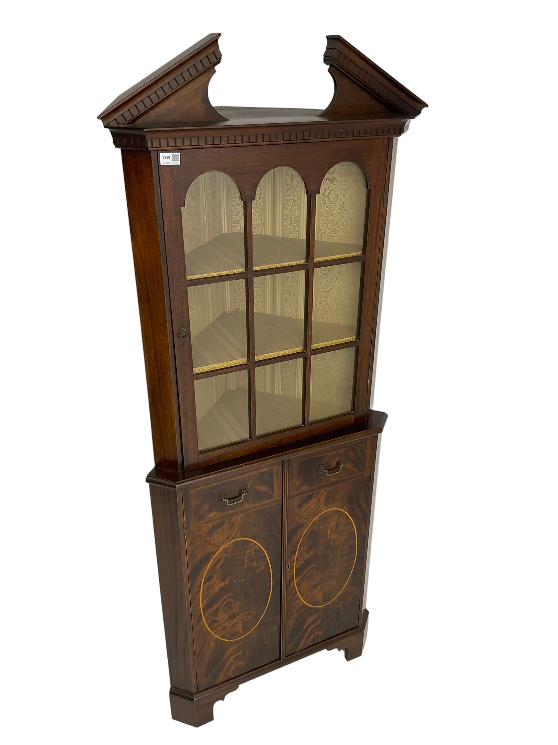 Georgian design inlaid mahogany corner cabinet, broken dentil pediment over single glazed door enclosing two shelves, base fitted with two doors with faux drawer facias