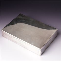 German 925 standard silver cigarette box with hinged lid  and a silver bottle coaster with turned wood base London 1986 Maker M C Hersey & Son