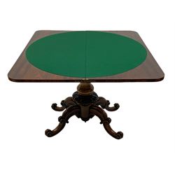 Victorian figured rosewood card table, fold-over swivel top with circular baize lining, moulded frieze with stylised flower head carving to corners, turned column with egg and dart decoration, on quadruple splayed c-scroll carved supports, with brass castors