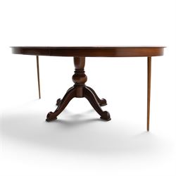 Barker & Stonehouse - cherrywood oval extending dining table and four upholstered chairs, the table with additional leaf extended to cm, raised on a turned column above swept supports, the chairs with brown upholstery and multi-coloured geometric design