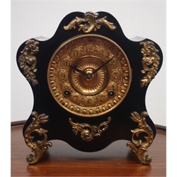  19th century cartouche shaped mantle clock, ebonised case with gilt metal leaf mounts, 'Ansonia Clock Co.' twin train movement, H25cm  