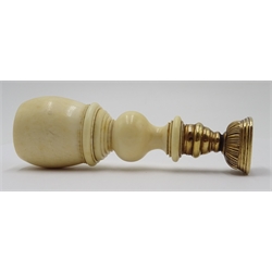  19th century desk seal, turned ivory handle with gilt metal base, lacking seal matrix, L9.5cm   