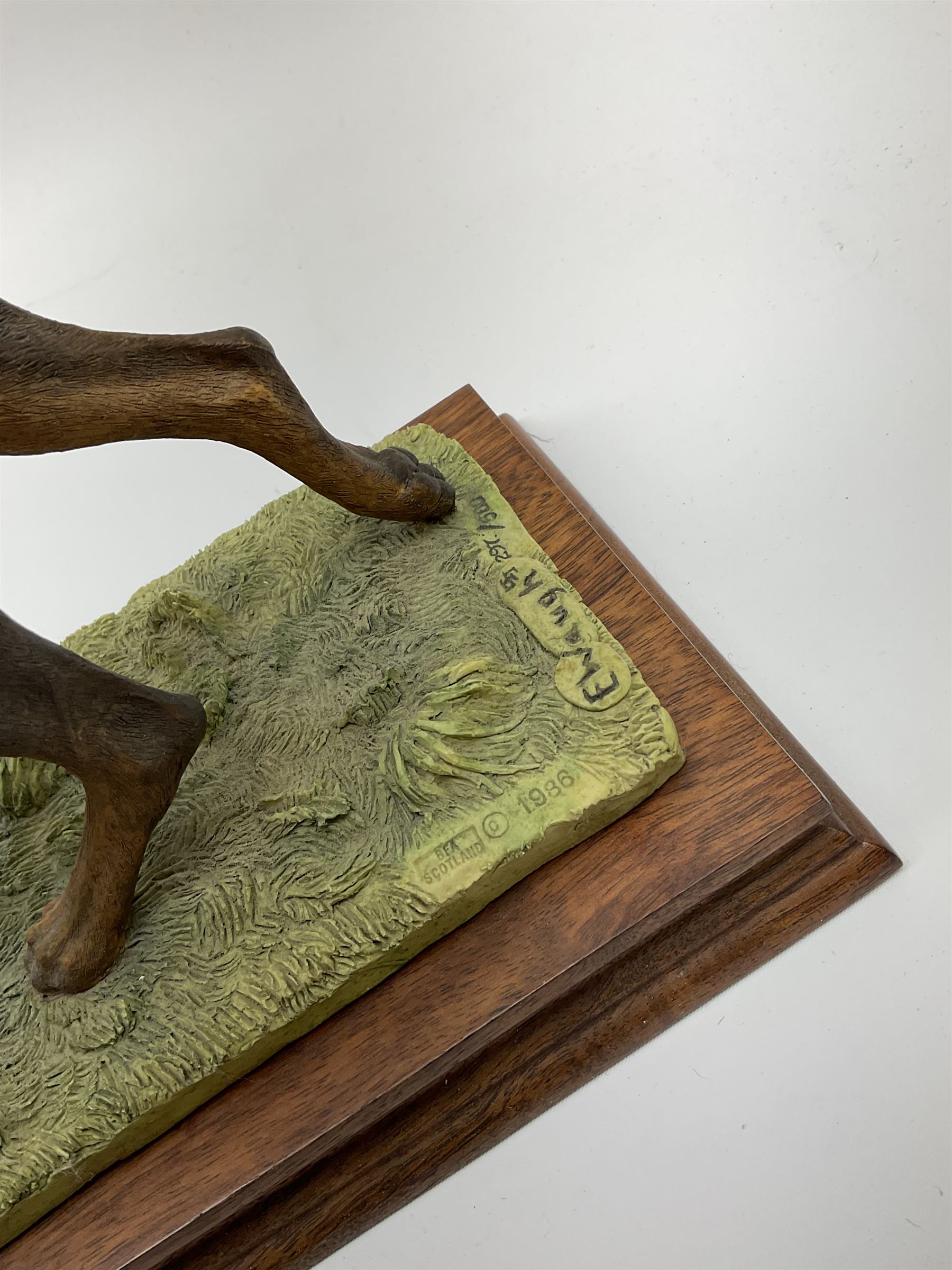 Border Fine Arts Doberman Pinscher, black with brown markings, limited edition 279 of 500 modelled by Elizabeth Waugh, with plinth H20.5cm, together with Border Fine Arts Doberman Pinscher, dark brown with light brown markings, limited edition 297 of 500 modelled by Elizabeth Waugh, with plinth H20.5cm