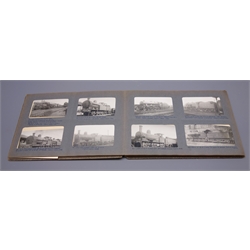  Mid-20th century album containing forty-seven fully annotated photographs of steam trains, each approx. 7 x 11cm, together with six loose larger photographs of trains  