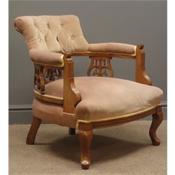  Late Victorian walnut framed tub chair, upholsterd cresting rail, arms and seat, pierced splat, cabriole legs  