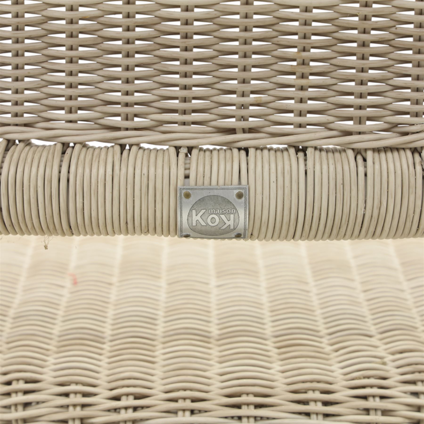 Kok Maison - 20th century French wicker chairs, set of eight including two carvers, with arched woven backs and seats in close cane weave, the frames painted cream, the arms with wrapped wicker detail, raised on turned supports united by cross shaped stretchers