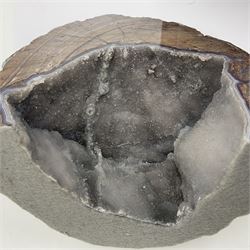 Pair of Dugway geode, natural edged bookends, in purple tones, H16cm 