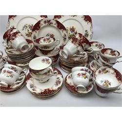 Paragon Rockingham pattern tea wares, comprising seven breakfast cups, seven tea cups, nine coffee cups, sixteen saucers, and twelve smaller saucers, two open sucriers, one plate, two cake plates, and fifteen side plates. 
