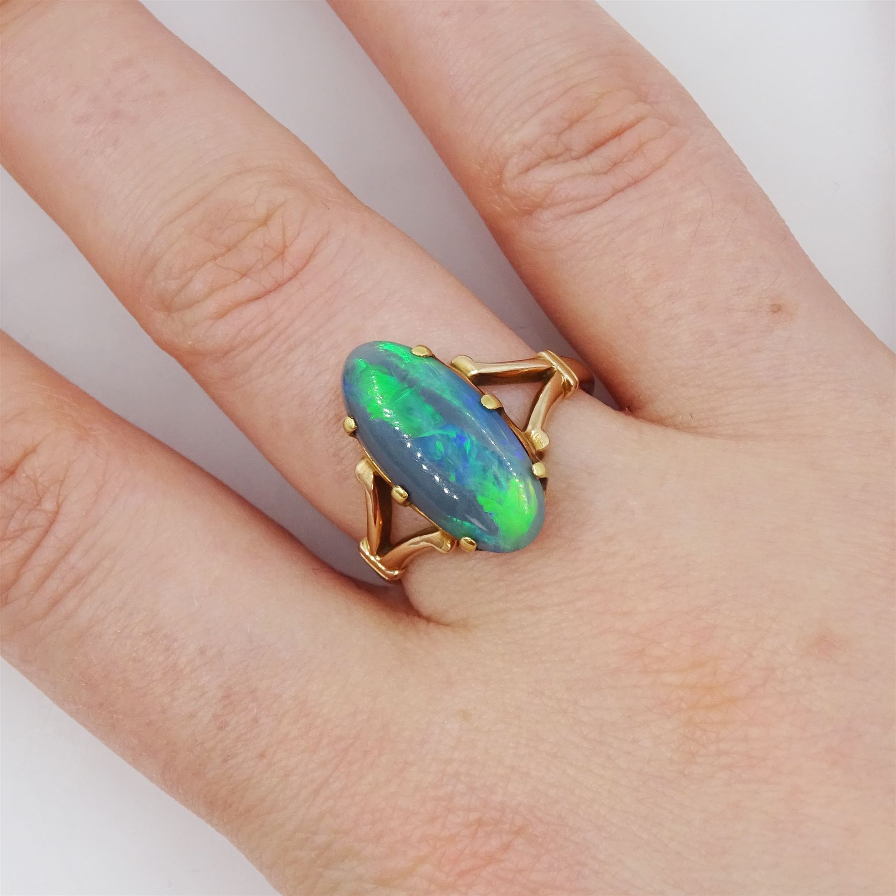 14ct rose gold single stone black opal ring