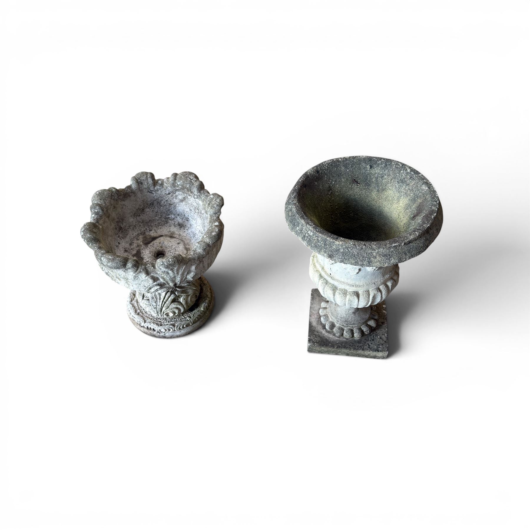 Cast stone classic garden urn, raised on squat pedestal and an ornate cast stone urn (2)