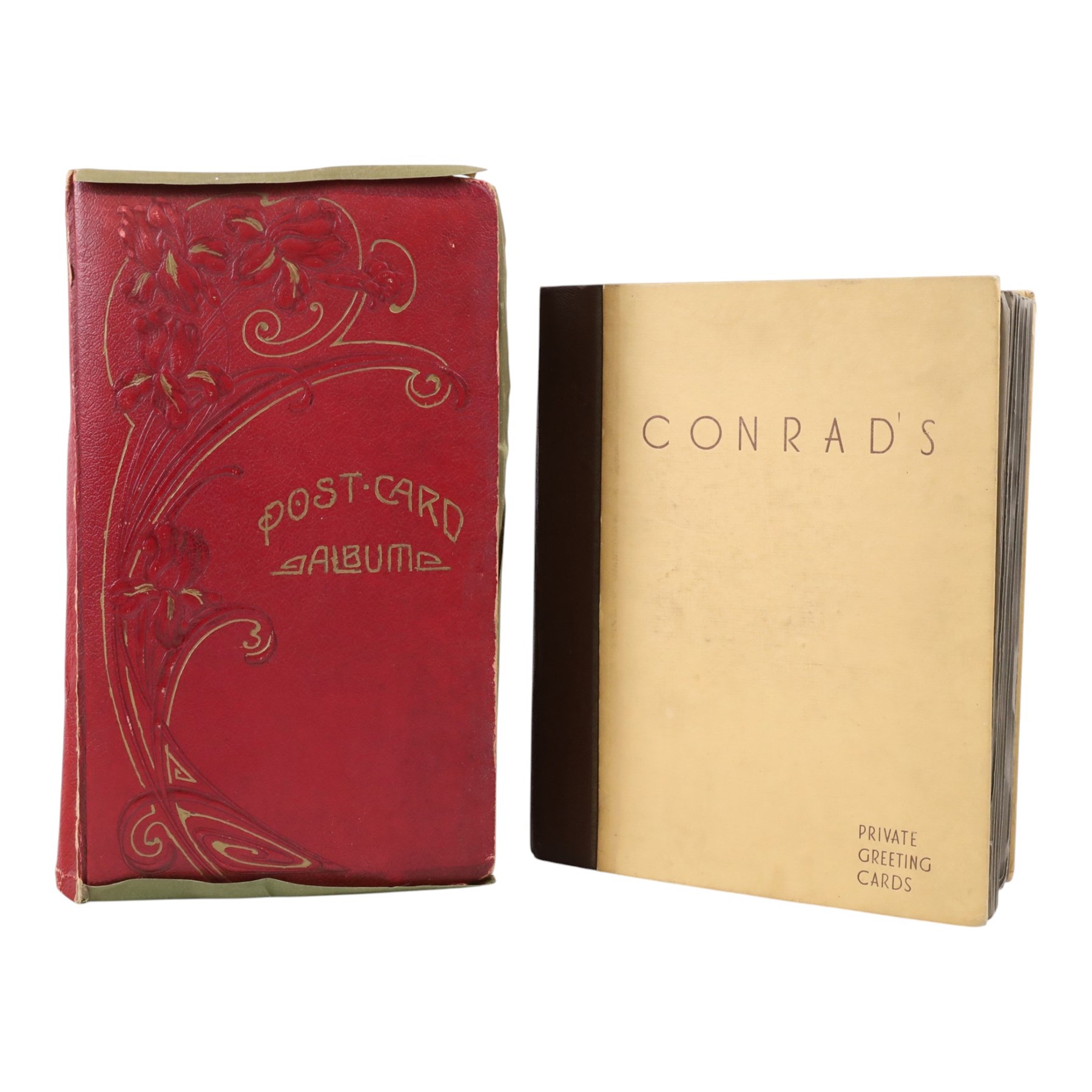 Collection of postcards in a album, together with an album of first day covers 