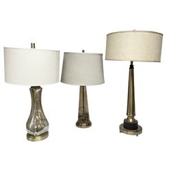 Three metal and glass table lamps, with fabric shades, tallest H84cm