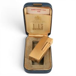 Michael Kors black leather ladies wallet, with note compartments, zip pocket, card slots and all around zip fastening, together with Pandora silver bracelet, in box and Dunhill gold plate lighter, cased  