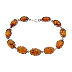 Silver oval Baltic amber link bracelet, stamped 925