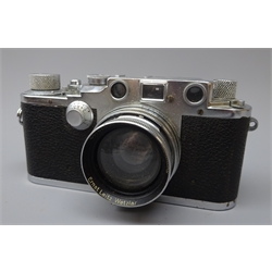  Leica 35mm film camera, Ernst Leitz Wetzlar D.R.P. No.371257, with Ernst Leitz Wetzlar Summitar f=5cm 1:2 No.579109 lens cover, in leather Leica case  