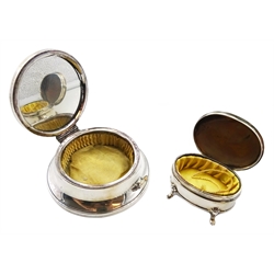 Silver lidded jewellery box raised on four legs and silver mounted glass dressing table jars by James Deakin & Sons, Chester 1920, silver mounted hairbrush and come by  Samuel M Levi and a lidded jewellery box hallmarked