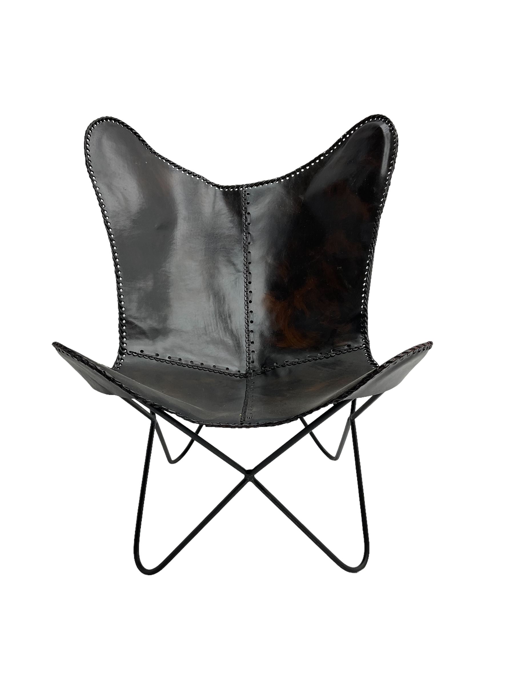 Butterfly Chair, black finish metal frame with stitched slung leather cover