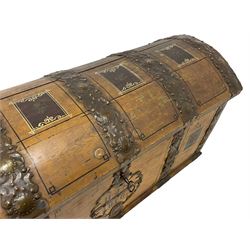 19th century painted oak sea chest, hinged dome top enclosing small compartment, bound by shaped and pressed metal strapwork, scumbled finish to resemble oak and painted with small vignettes depicting portraits and landscapes within panels, fitted with large wrought metal carrying handles, the front inscribed 'H.J.S. 1870' 