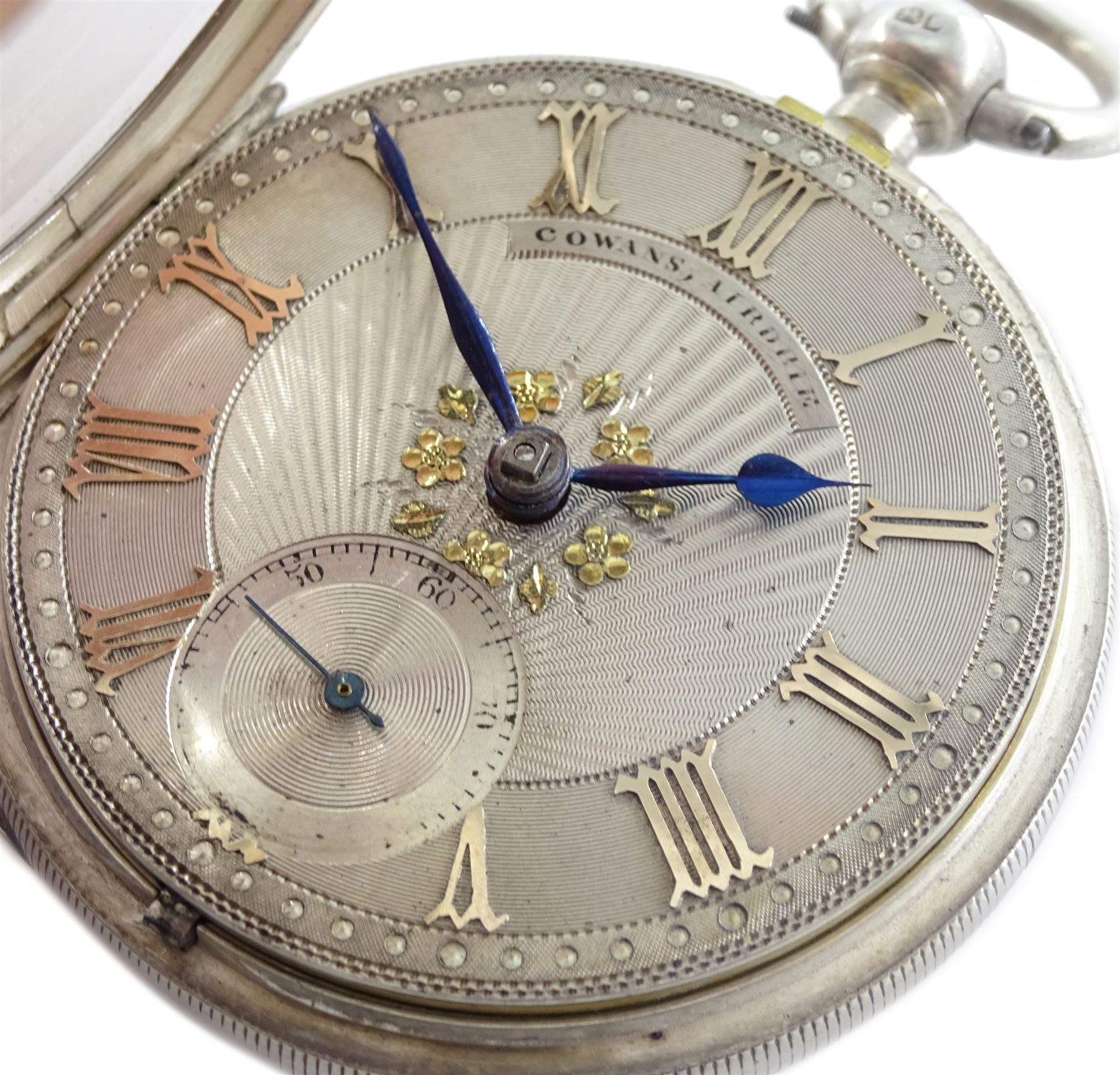 Victorian silver open face English lever fusee pocket watch by Cowans, Airdrie, No. 18235, balance cock with engraved flower decoration, engine turned silver dial with Roman numerals and subsidiary seconds dial, case by Robert Gravenor, Chester 1889
