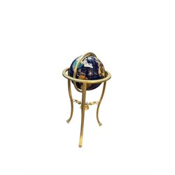Floor standing hardstone terrestrial globe, on brass tripod base with compass, H90cm