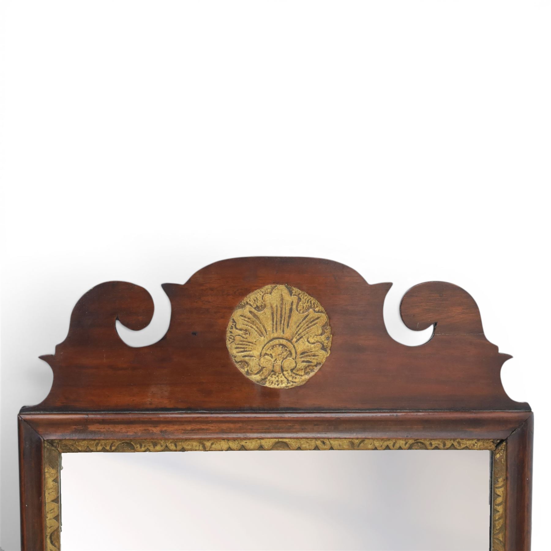 Late 19th century Chippendale style mahogany wall mirror, featuring gilded eagle pediment; together with a smaller similar mirror