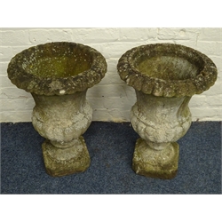  Pair composite stone urn planters, circular form with egg and dart rim and gadroon underside, D46cm, H68cm  